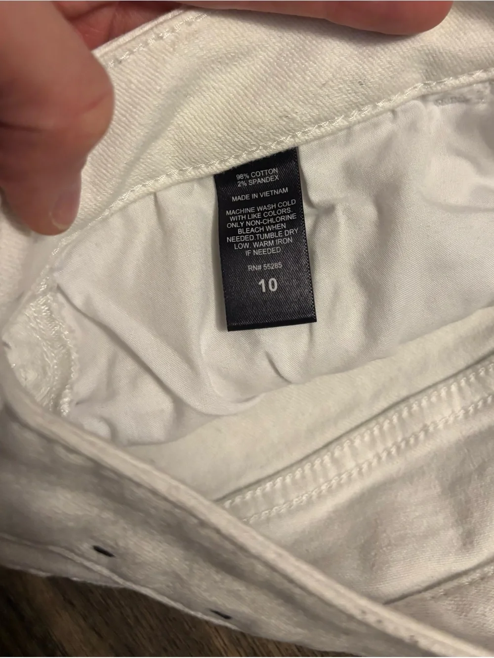Express white distressed shorts